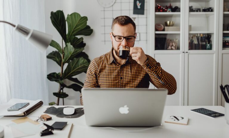 a man drinking a coffee while Choosing the Right WordPress Plugins